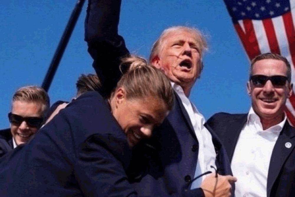 An iconic photo of secret service agents pulling Donald Trump to safety has been doctored. In the original, the agents weren’t smiling.