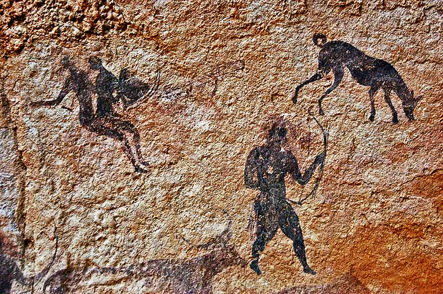 Rock art in Algeria’s Tassili n’Ajjer plateau has been dated at seven to 10 thousand years before present. The dog at the top right of this hunting scene shows typical Africanis traits – long snout, pointed ears, elegant build and curled-up tail. (Alberto Bertelli)
