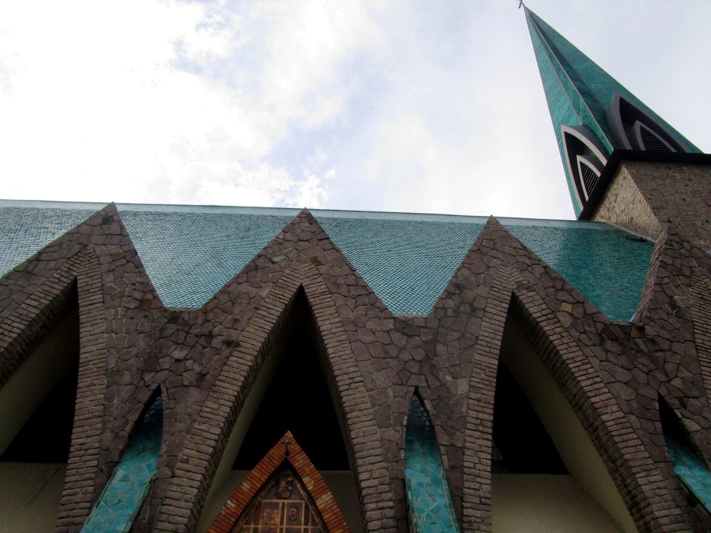 The Basilica of Saint Anne in Brazzaville, the capital of the Republic of the Congo, is a Catholic church built in the 1940s using a mix of European and African design styles. The vast green-tiled building is 85 metres long, with a transept 45 metres wide and a 22-metre-high arch. (Photo © Tom Robertson)