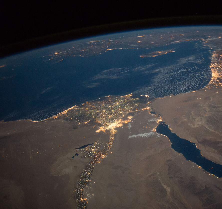 ISS049e004516 (09/16/2016) --- This nighttime view of northern Egypt and the Sinai Peninsula was captured by the Expedition 49 crew aboard the International Space Station. The city of Cairo can be seen to the left at the top of the Nile river. Atop the sparsely lit Sinai Peninsula can be seen cities in Israel, including the brightly lit city of Tel Aviv on the Israeli coast along the Mediterranean sea.