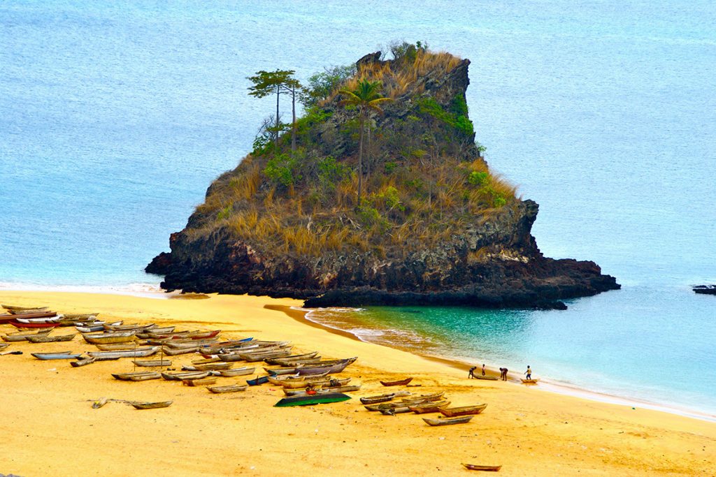 Africa - Fishing boats, beach and rock formation on Annobón Island, Equatorial Guinea 