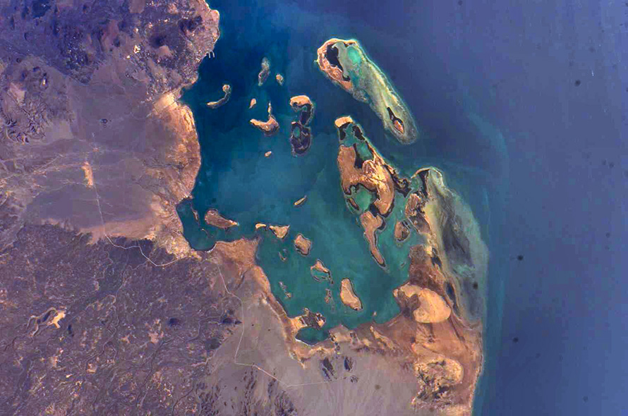 Islands and coral reefs on the Red Sea coast of Eritrea, a small country in eastern North Africa, in an image taken by a crewmember aboard the International Space Station during Expedition 13, in April 2006. (Nasa, CC BY-NC 2.0)