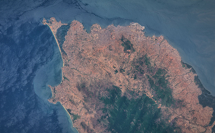 Freetown, an important West African port city and the capital of Sierra Leone, captured by Sentinel 2A satellite on 28 March 2016. Its harbour, the centre of the city's economy, lies in the estuary of the Sierra Leone River and is one of the largest natural deep water harbours in the world. The city of Freetown was founded in 1792 by freed African-American slaves. (Antti Lipponen, CC BY 2.0)