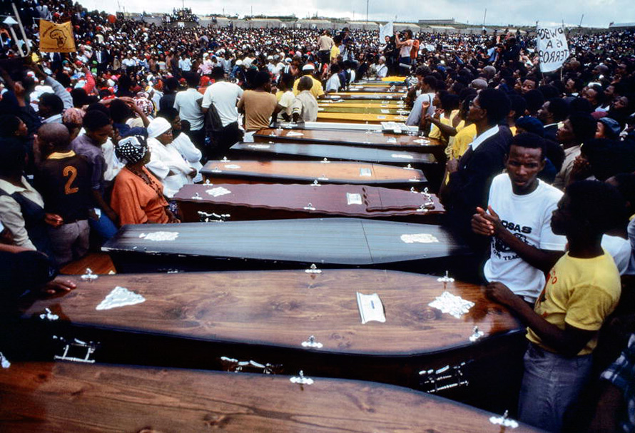 The coffins of those slain in the Langa Massacre of 21 March 1985. Twenty-five years to the day after the infamous Sharpeville Massacre, in which 69 people were killed, police opened fire on a crowd of people on their way to attend a funeral in Langa, Uitenhage, in the Eastern Cape. At least 20 people were killed. (UN Photo, CC BY-NC-ND)