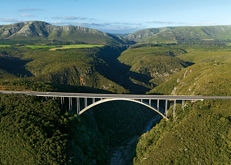 The Storms River Bridge in the Tsitsikamma region of the Eastern Cape, with the Baviaanskloof Mountains in the distance. (Rodger Bosch, Media Club South Africa)