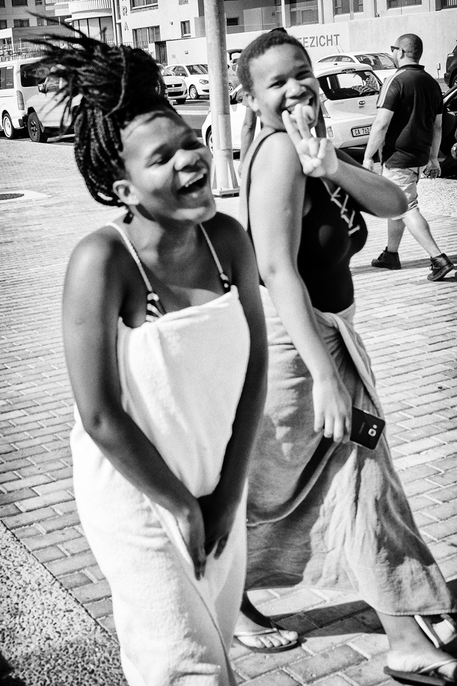 Holidaymakers on the way to the beach in the seaside resort of Strand (Afrikaans for “beach”) on the eastern shore of False Bay in the Western Cape. (Steve Crane, CC BY-NC-ND 2.0)