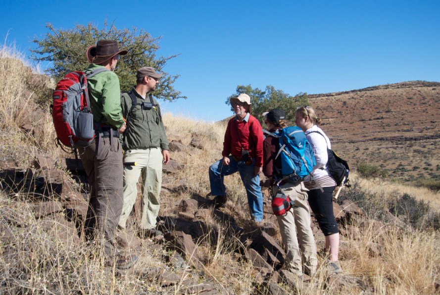 In search of ancient bacteria ... The scientists on a 2014 excursion to collect fossils near the town of Kuruman in South Africa's Northern Cape province. From left: Clark Johnson, University of Wisconsin, Madison; Aaron Satkoski, University of Wisconsin, Madison; Nicolas Beukes, University of Johannesburg, South Africa; Breana Hashman, University of Wisconsin, Madison; and Kira Lorber, University of Cincinnati. (Image: Andrew Czaja, University of Cincinnati)